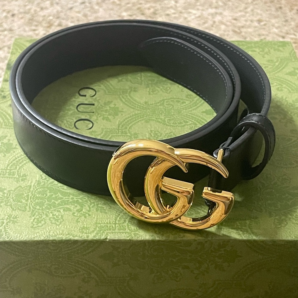 Gucci Black and Gold Leather Belt with Iconic GG Buckle